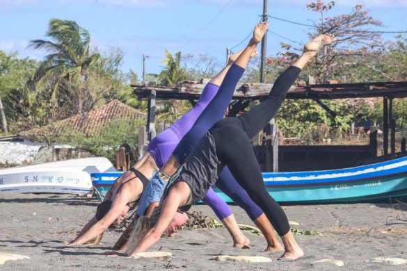 yoga three-legged-dog, nicaragua beach,